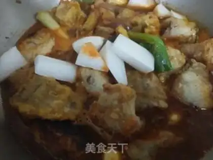 Make Mingtae fish stewed radish step 7