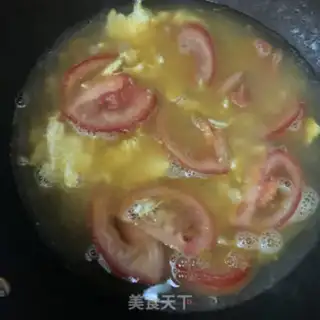 Make Tomato egg and ham noodles step 6