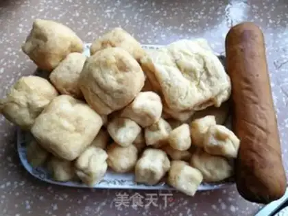 Make Sour chicken oil tofu chicken claws step 2