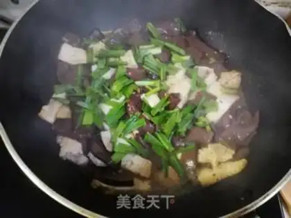 Make Garlic sprouts and tofu step 3