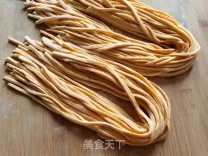 Make Hands on pumpkin noodles step 8