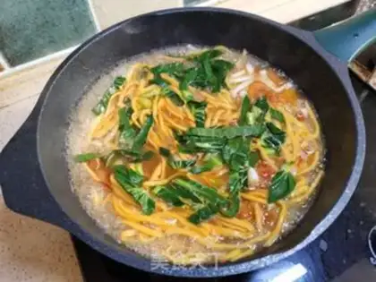 Make Hands on pumpkin noodles step 13