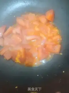 Make A simple tomato fried egg step 3