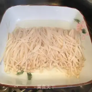 Make Garlic oil and golden mushrooms step 7