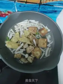 Make Seafood mushroom egg dumpling soup step 7