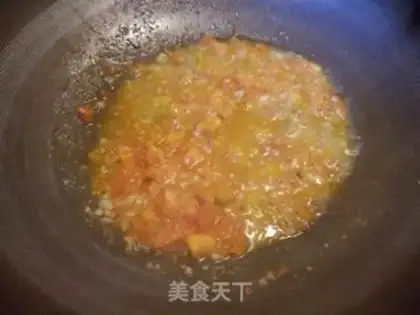 Make Seafood tomato pasta step 11