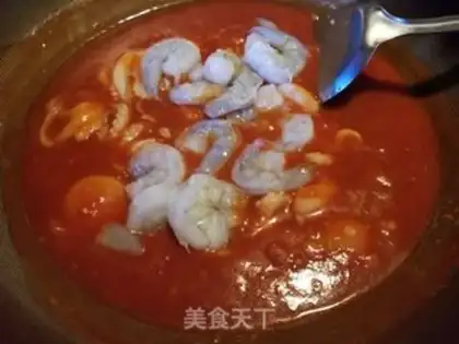 Make Seafood tomato pasta step 12