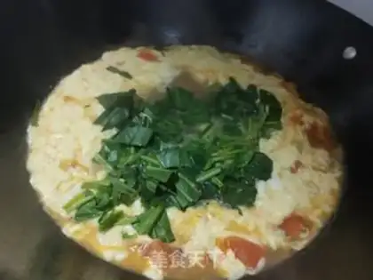 Make Tomato spinach egg soup step 11