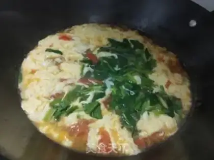 Make Tomato spinach egg soup step 12