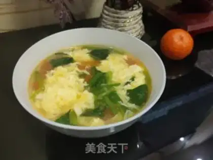 Make Tomato spinach egg soup step 14