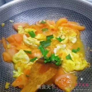 Make Tomato fried eggs step 9