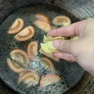 Make Tomato fish head soup step 5
