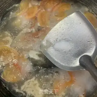 Make Tomato fish head soup step 7