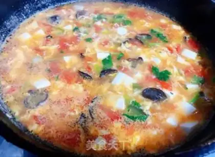 Make Tomato curry ear and egg soup step 9