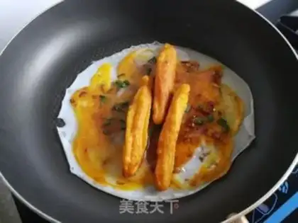 Make Oiled egg burrito step 5