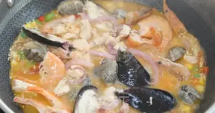 Make Spanish seafood quinoa step 7