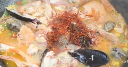 Make Spanish seafood quinoa step 8