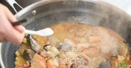 Make Spanish seafood quinoa step 9