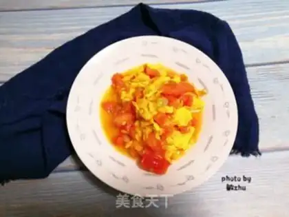 Make Tomato fried eggs step 10