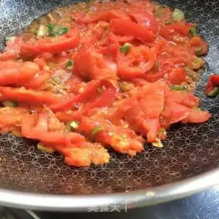 Make Tea and tomato fried eggs step 6