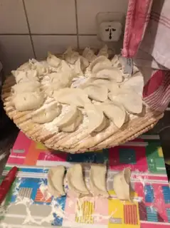 Make Pour a lamb dumpling step 13