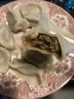 Make Pour a lamb dumpling step 16