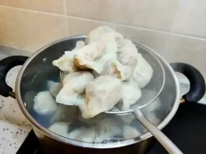 Make Pork abalone carrot dumplings step 18