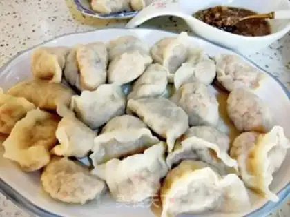 Make Pork abalone carrot dumplings step 19