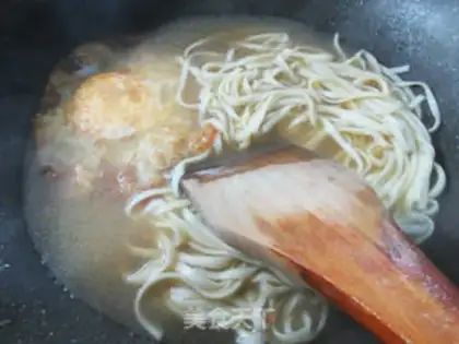 Make Duck egg beef noodles step 5