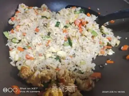 Make cucumber carrot and egg fried rice step 7