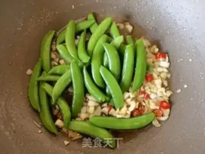 Make Garlic sweet peas step 9