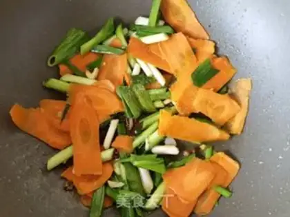 Make Carrot garlic and fried eggs step 9