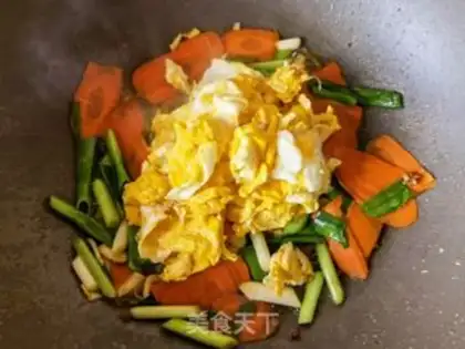 Make Carrot garlic and fried eggs step 11