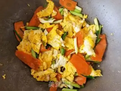 Make Carrot garlic and fried eggs step 12