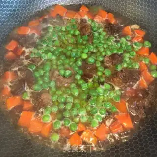 Make Carrots, peas, ribs step 7