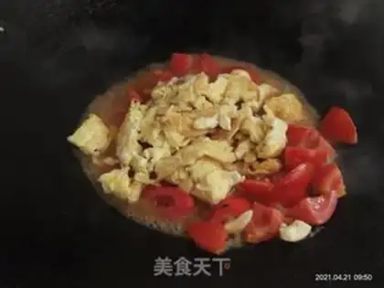 Make Tomato fried eggs step 11