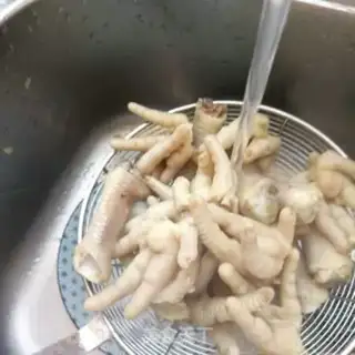 Make Chicken claws with red oil step 16
