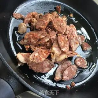 Make Onion pepper fried sausage step 5