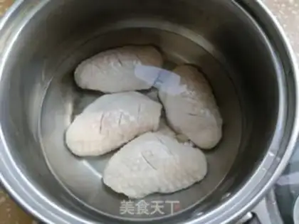 Make Chicken wings and potatoes step 1