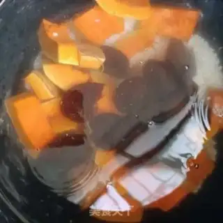 Make Pumpkin date rice congee step 6