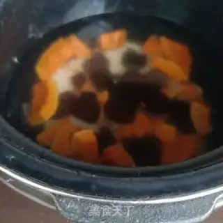 Make Pumpkin date rice congee step 7