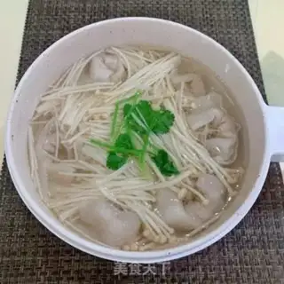 Make ♪ Golden mushrooms roll out fish-skin soup ♪ step 7