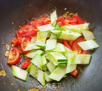 Make Tomato cucumber fried eggs step 9