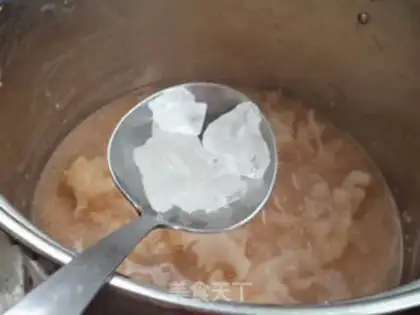 Make Peanut silver ear rice porridge step 8
