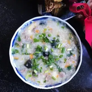 Make Double rice-skinned beef porridge step 10