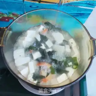 Make Clothes and tofu soup step 8