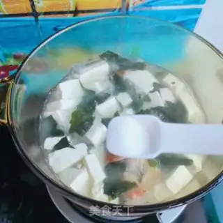 Make Clothes and tofu soup step 9