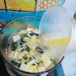 Make Clothes and tofu soup step 11
