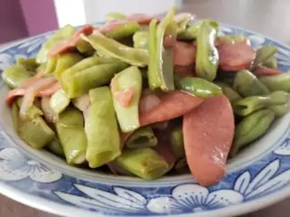 Make Four season beans with ham and sausage step 5