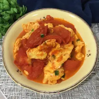 Make Tomato fried eggs step 8